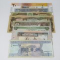 Lot of 8 bank notes - excellent - mostly Arabic