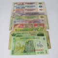 Lot of 10 laminated bank notes from all over