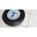 Seiberling Working Tyre Man Cave Wall Clock in a Seiberling Tyre