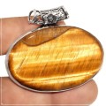 Natural Tigers Eye Oval Gemstone .925  Sterling Silver Pendant