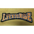 Live to ride eagle patch in orange and white 17.5cm x 6cm