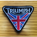 Triumph flag with black and white badge patch