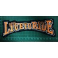 Live to ride eagle patch in orange and white 17.5cm x 6cm
