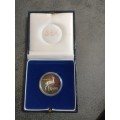 1989 Silver R1 coin in capsule and SAM box