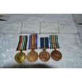 Full Size SAPS medal group of 4 to W/O P.A. Els. With issue boxes.