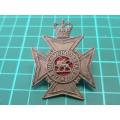 The Royal Rhodesia Regiment cap badge.