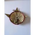 Italian WWII Motor Transport Badge with all original fastening plates and cloth backing.