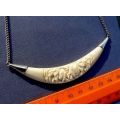 CARVED ELEPHANTS, PENDANT STERLING SILVER AND IVORY. ON SILVER CHAIN.VINTAGE BUT AS NEW.