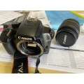 Canon 1000D camera with lens,battery,and charger
