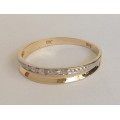 Natural diamond band in 9K yellow gold