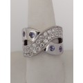 *CD DESIGNER JEWELRY* 1.30ctw Cr Tanzanite and CZ Cross over Ring- Size R