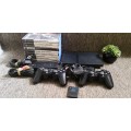 PS2 SLIM CONSOLE WITH 2 CONTROLLERS AND 10 GAMES