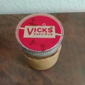 Vintage collectable tins with an old rear Vicks bottel