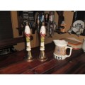 Matching pair of porcelain and brass English draught beer pulls