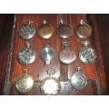 11 vintage-style battery operated  pocket watches