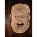 Vintage carved tribal wooden mask. Wonderfully detailed.