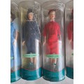 Set of 9/9 Hermes Design Cathay Pacific`s Flight Attendant Uniform doll set 1946-1999.