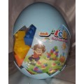 Egg shaped container with building blocks