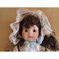 Porcelain Doll - height 40cm. width 15cm