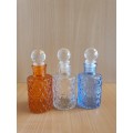 Set of 3 Small Glass Bottles - height 10cm. width 5cm