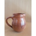 Pottery Jug - height 12cm. width 10cm