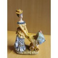 Female Figurine with Pram & Baby