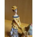 Female Figurine with Pram & Baby
