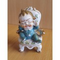 Porcelain Toddler on Armchair Figurine (Made in Japan)