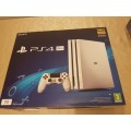Playstation 4 PRO 1TB Glacier White Special Edition (2 Controllers + 10 Games+Dual Charging station)