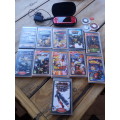 Sony PSP Red with 14 games and a 4GB memory card.