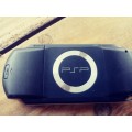 PSP 1000 ( Fair condition) with 8 games