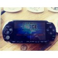 PSP 1000 ( Fair condition) with 8 games