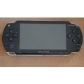 PSP 1001 ( Very Good condition) + 4 games