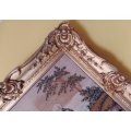 Antique needlework embroidery in ornate gilded frame