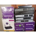 Lot of 14 switches & routers new & used, 7x Netgear Extenders, 1x Netgear AC1200, 5x Dlink switch,