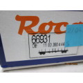 HO SCALE : ROCO LONG FLAT CAR WITH GREY PIPE LOAD (BOXED) - LOT 891z