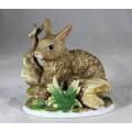 Rabbit on a log figurine - Bid Now!!