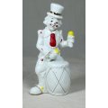 A CLOWN IN A POLKA DOT SUIT PLAYING A DRUM - BID NOW!!!