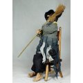 A LARGE WITCH SEATED ON A CHAIR-SHE TAPS HER FOOT AND HER EYES LIGHTS UP WHEN SWITCHED ON-BID NOW !!