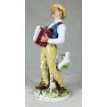A SPECIAL PORCELAIN OLD MAN PLAYING THE ACCORDIAN - BID NOW!!!!
