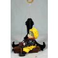 CLOWN SITTING IN A PLANE HANGING FROM A ROPE  - BID NOW!!