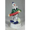 CLOWN ON A STAND PLAYING A CONCERTINA - BID NOW!!