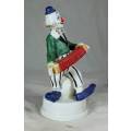 CLOWN ON A STAND PLAYING A CONCERTINA - BID NOW!!