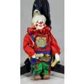 CLOWN IN A RED SUIT PLAYING - BID NOW!!