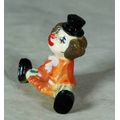 MOLDED ORANGE CLOWN SITTING - BID NOW!!