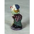 MOLDED CLOWN ON A STAND HOLDING A BROOM - BID NOW!!
