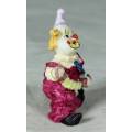 MOLDED CLOWN PLAYING A CONCERTINA - BID NOW!!