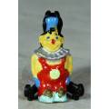 MOLDED CLOWN IN A RED DUNGREE AND A BLUE HAT - BID NOW!!