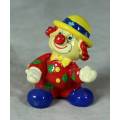 MOLDED CLOWN IN A YELLOW HAT AND RED HAIR - BID NOW!!