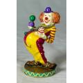 MOLDED CLOWN ON A STAND JUGGLING BALLS - BID NOW!!